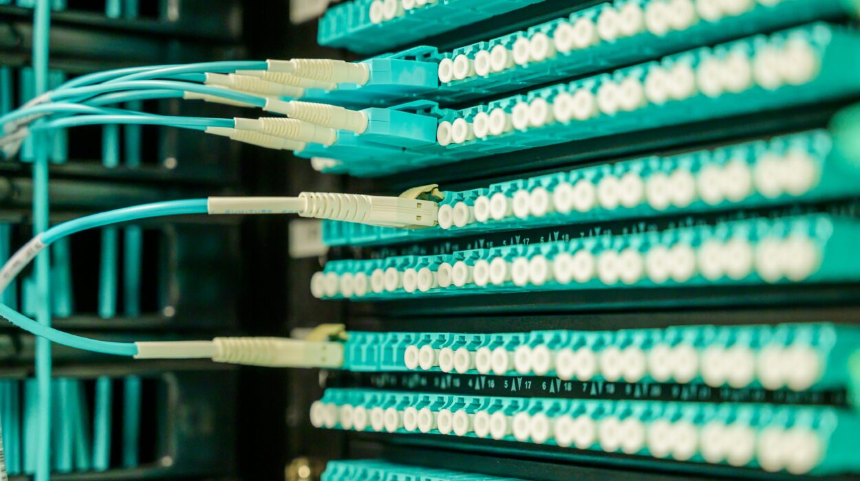 Engineers reviewing network design plans during real-world telecom deployment